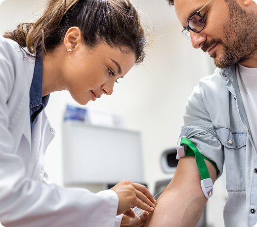 Medical professional with IV therapy equipment
